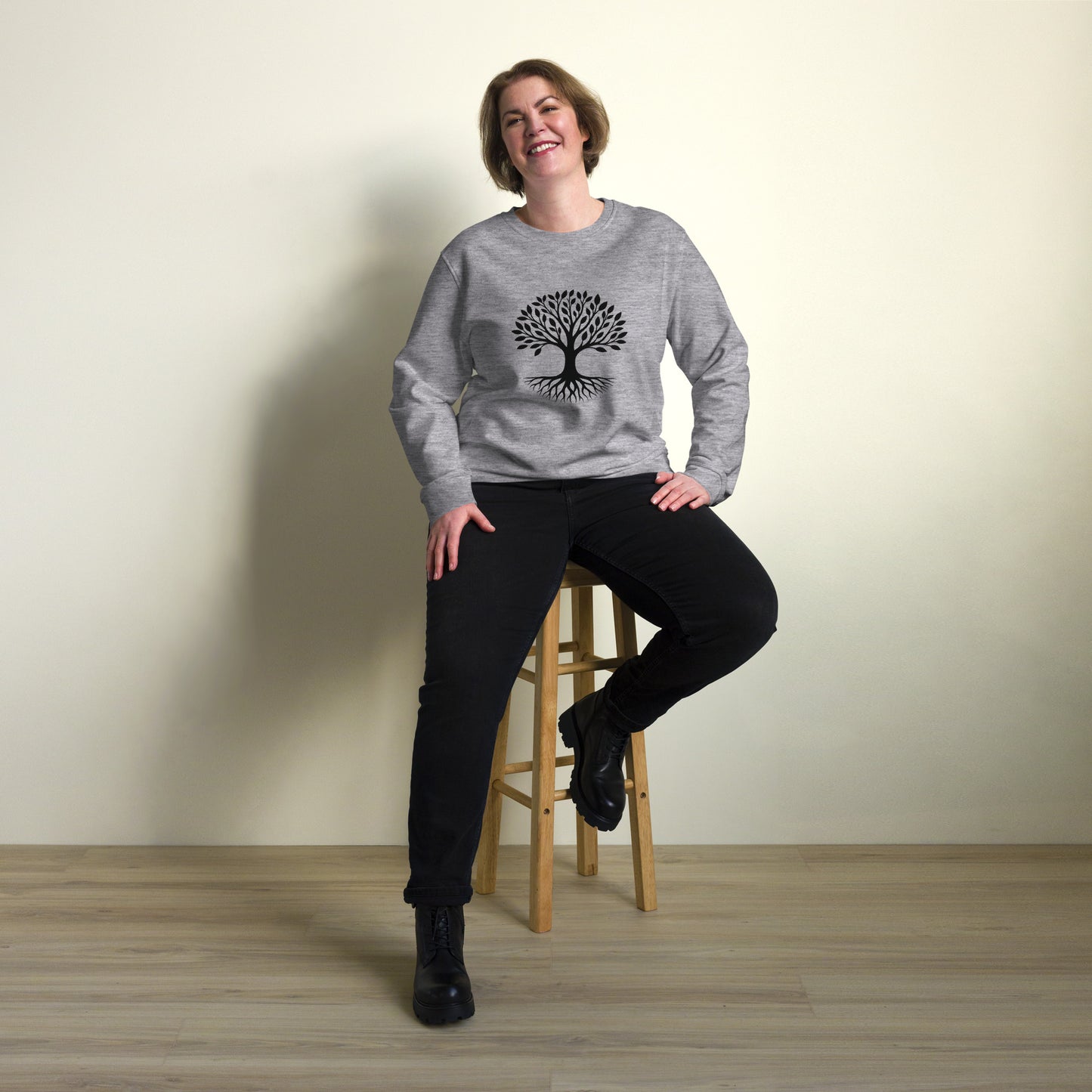 Lifestyle photo of Tree of Life organic sweatshirt with minimalist tree graphic – unisex crewneck – color: grey melange