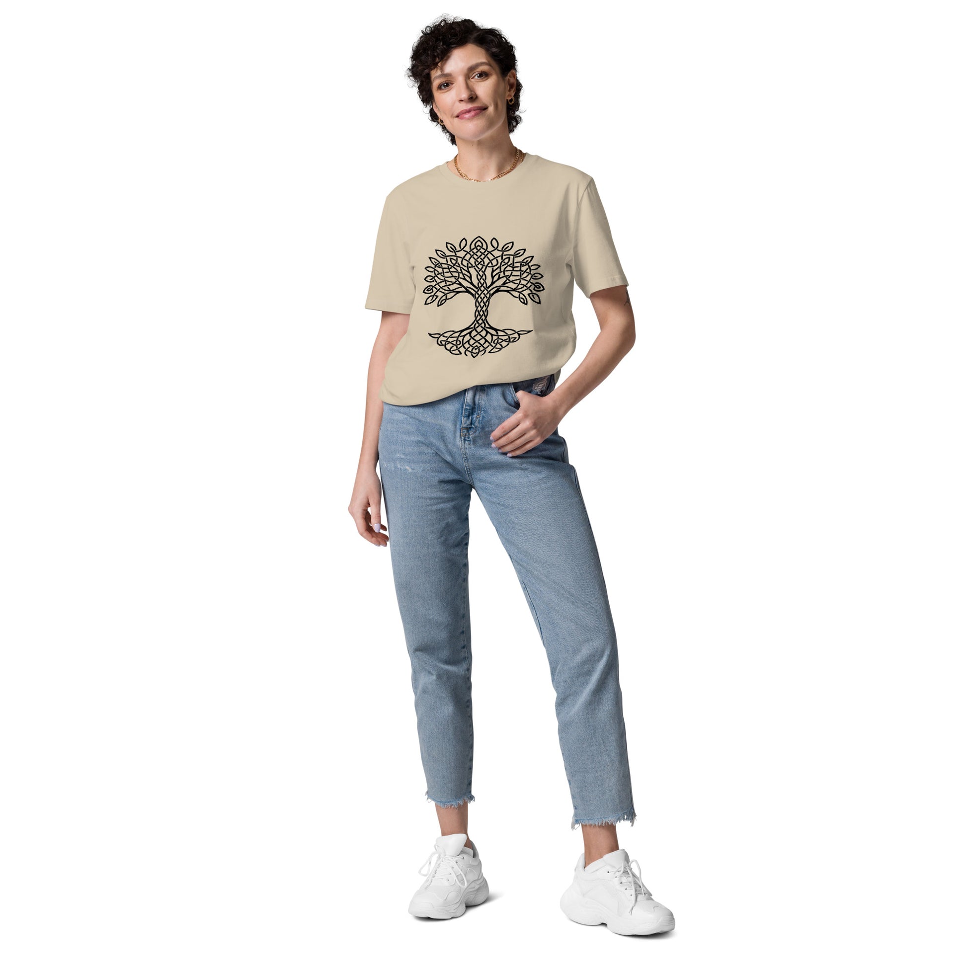 Lifestyle photo of Celtic Tree of Life organic unisex cotton t-shirt with black tree design on chest, color: desert dust