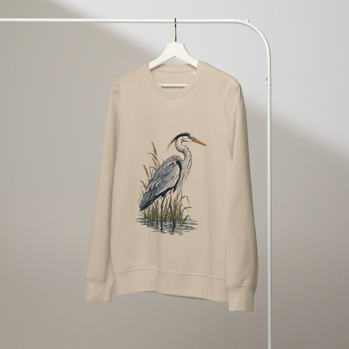 Wardrobe view of Desert Dust organic cotton sweatshirt with Grey Heron illustration designed by Gaia's Harmony. Color: desert dust