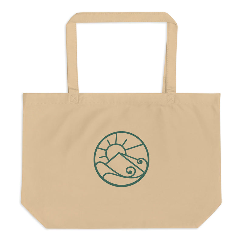 Front view of Large organic cotton tote bag with green Gaia’s Harmony logo on natural canvas fabric