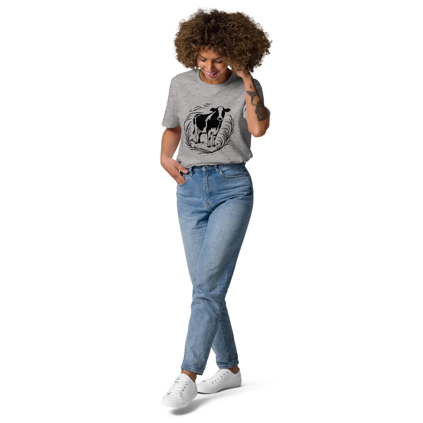 Lifestyle photo of Moving Forward organic cotton T-shirt with cow illustration – unisex tee – color: heather grey